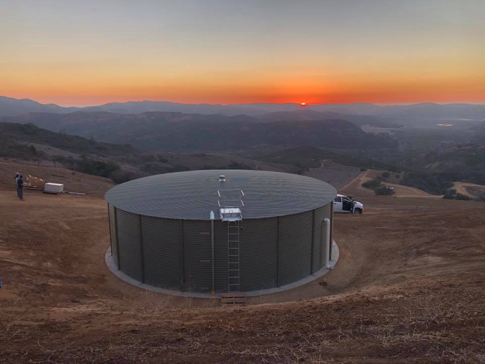 Pioneer steel water tank, in mangrove green installed on rural site 
